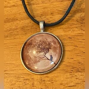 NEW Beautiful cat in a tree pendant (comes with a satin cord).